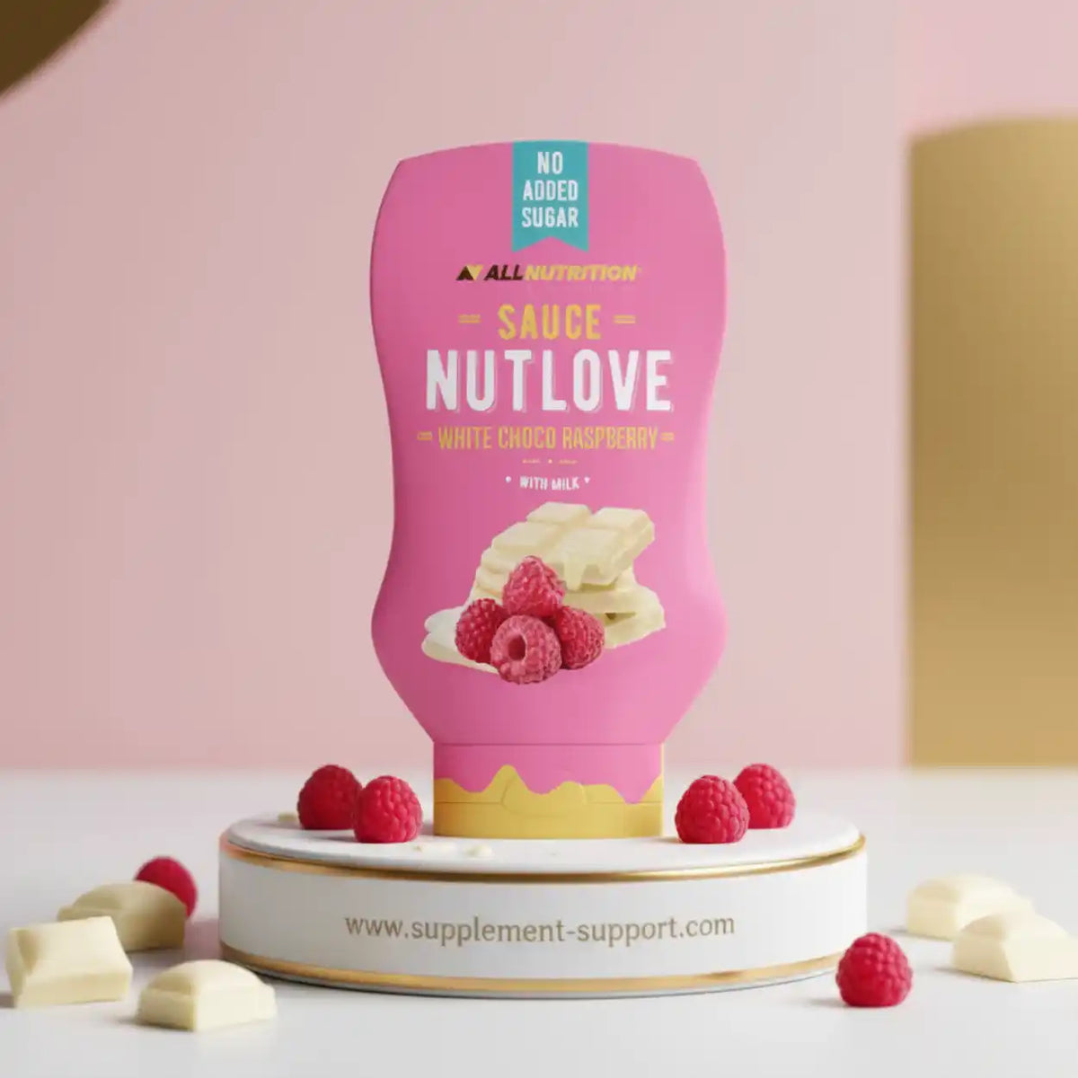 All Nutrition Nutlove Sauce in White Choco Raspberry mit Himbeeren auf weißem Podest