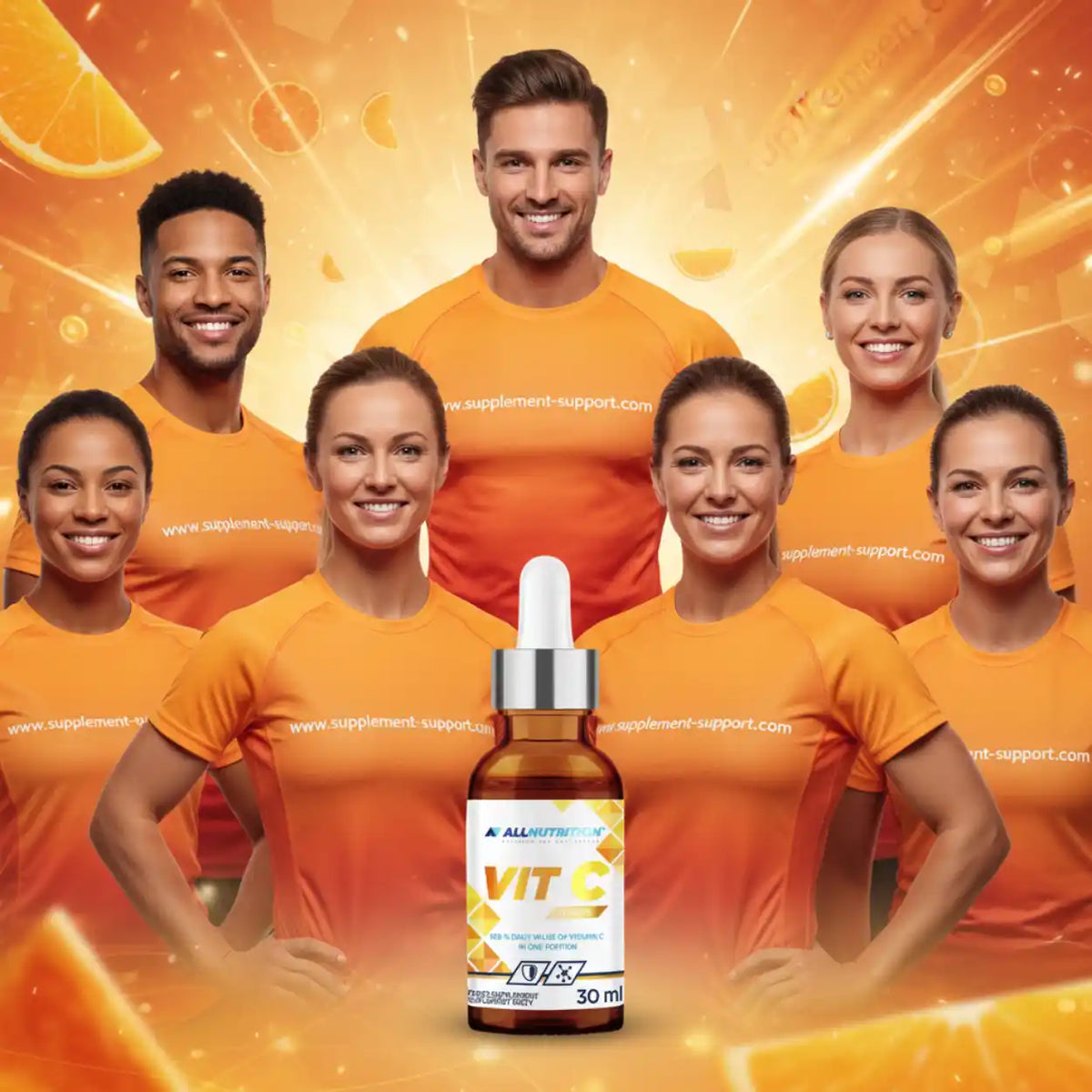 All Nutrition Vitamin C Tropfen 30ml vor einer Gruppe lächelnder Menschen in orangefarbenen Shirts.