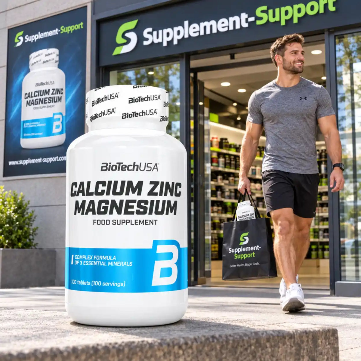 BioTech USA Calcium Zinc Magnesium Nahrungsergänzungsmittel vor einem Supplement-Shop.