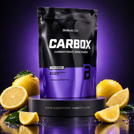 BioTech USA CARBOX Kohlenhydrat-Pulver Packung mit Zitronen auf violettem Hintergrund