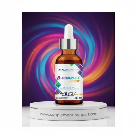 ALL NUTRITION® Vitamin B Complex Tropfen, 30ml Braunglasflasche mit Pipette auf weißem Podest.