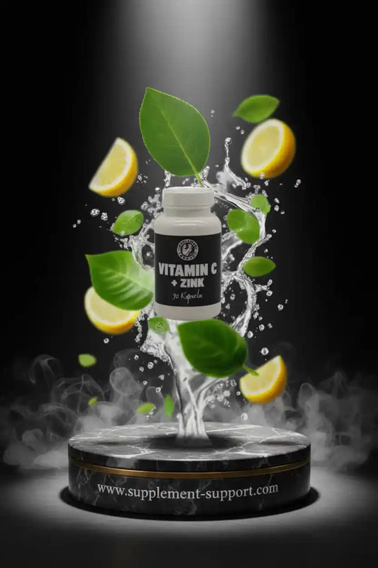 Vitamin C und Zink Nahrungsergänzungskapseln mit Zitronen und grünen Blättern auf schwarzem Hintergrund